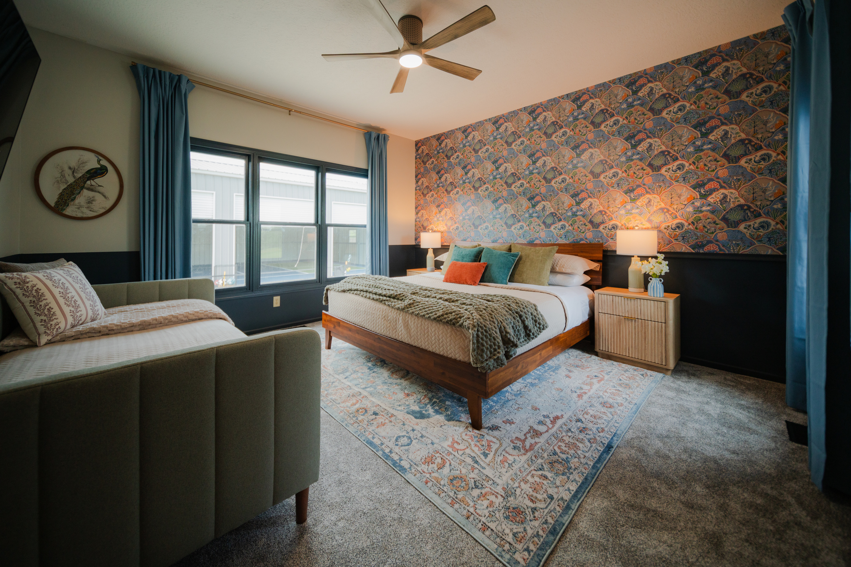 This thoughtfully designed primary suite offers a king bed, twin bed, and TV, making it ideal for families and couples alike.