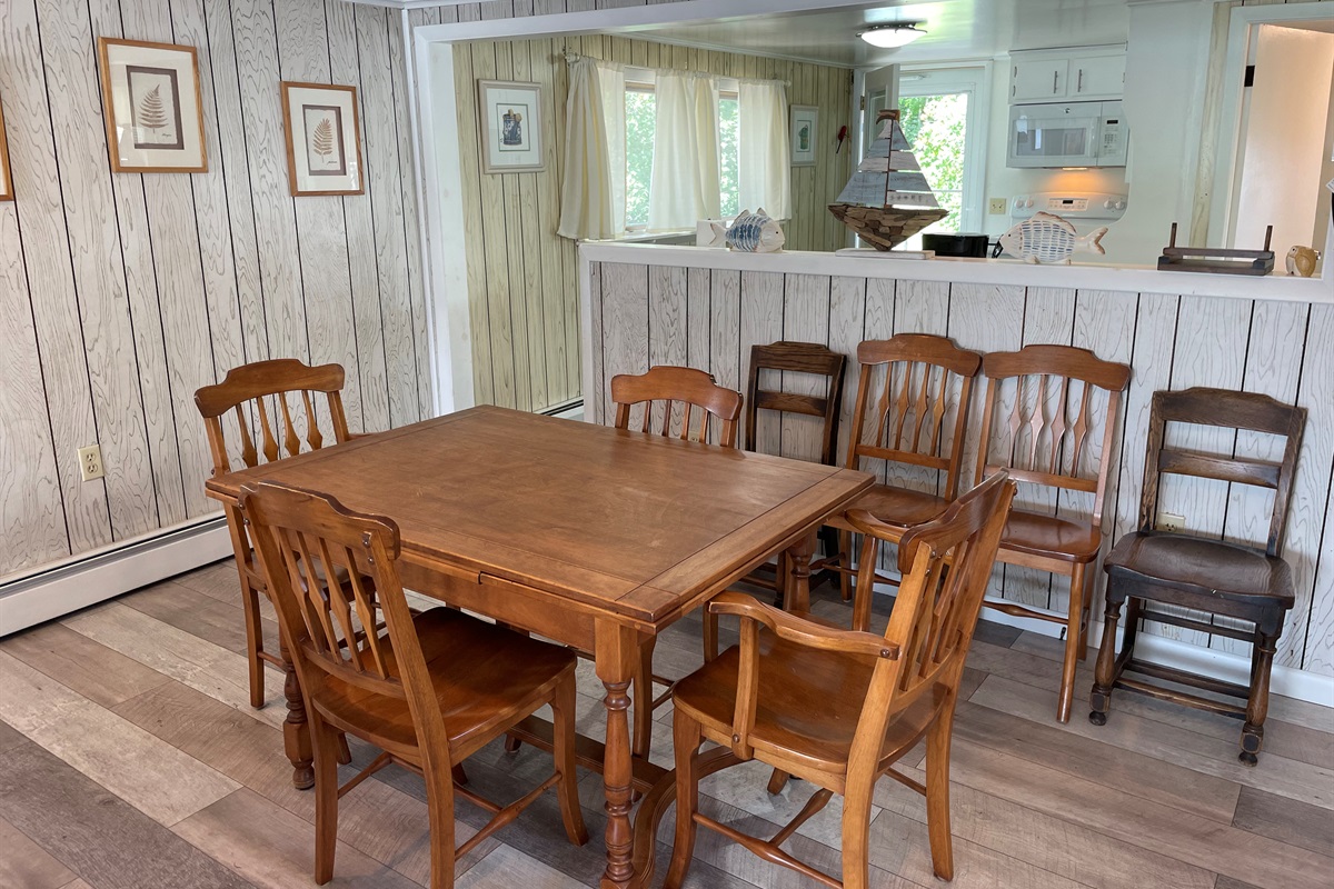 Dining area with kitchen beyond
