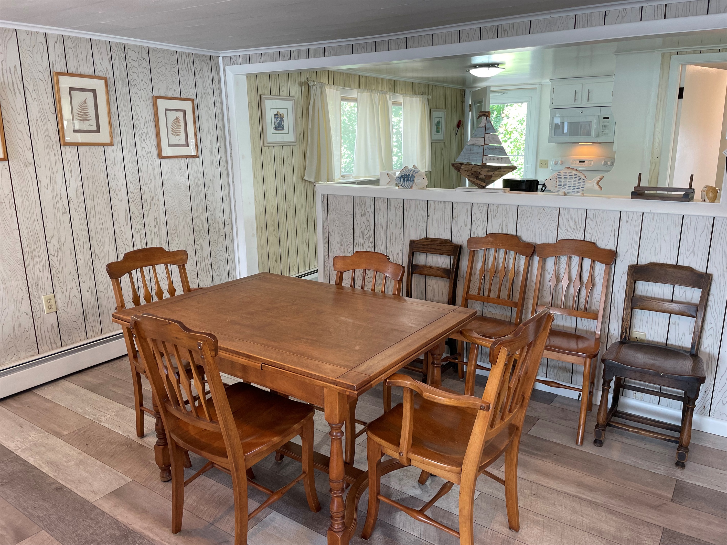 Dining area with kitchen beyond