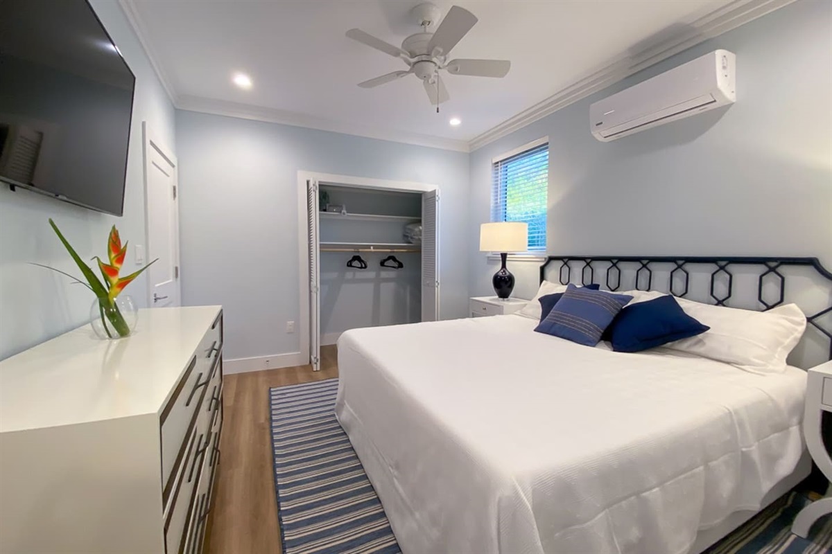 Master bedroom with king bed and ensuite bath.