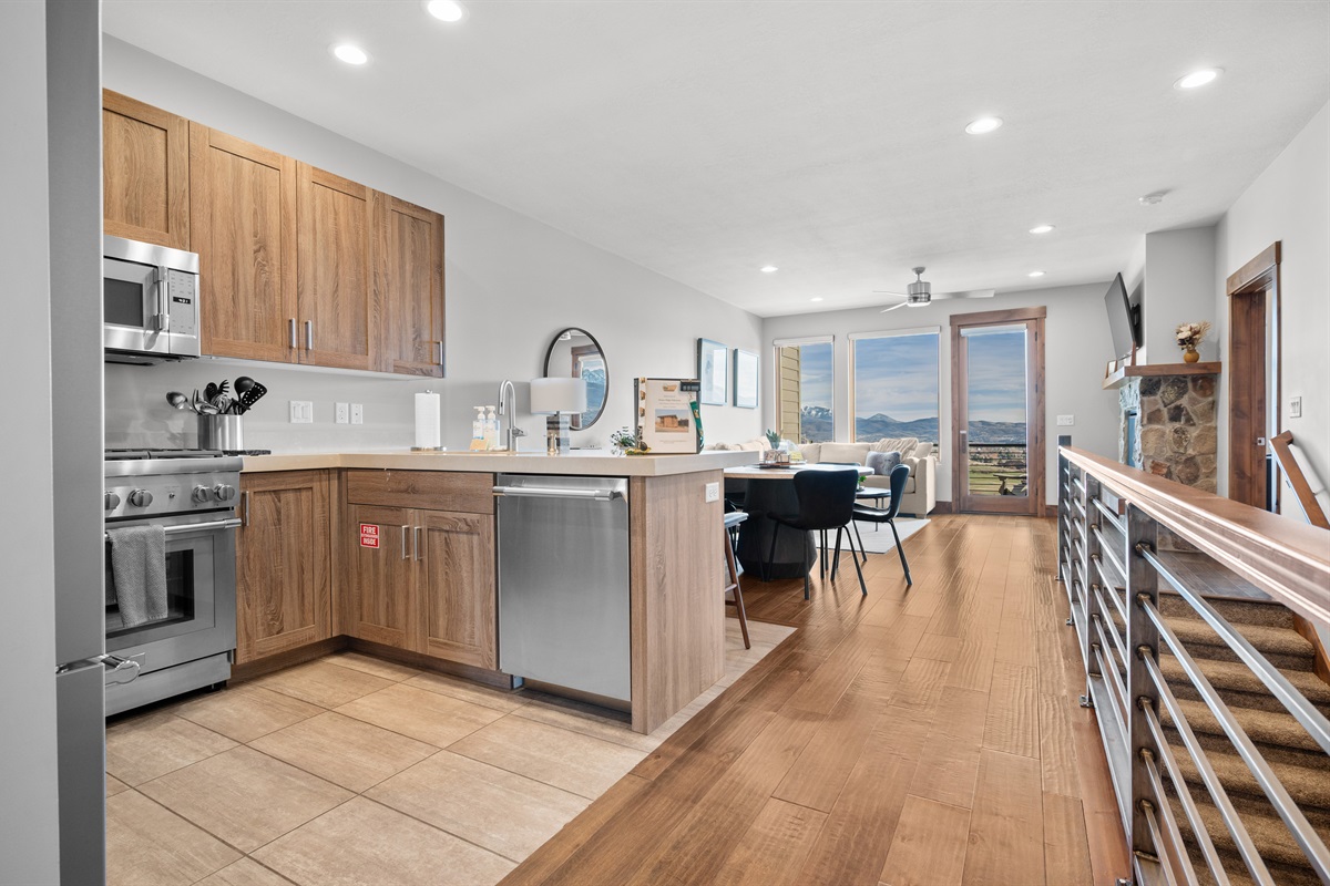 Fully equipped kitchen with stainless steel appliances and large island