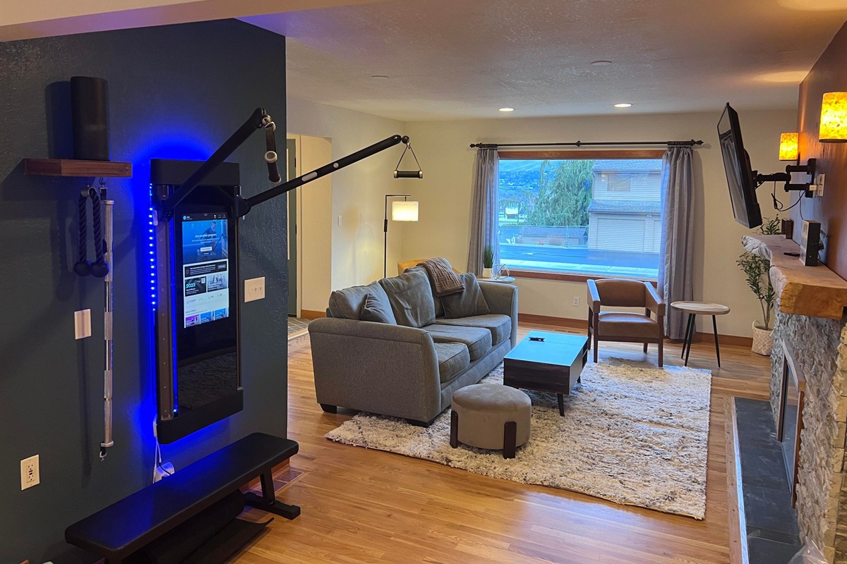 Living room complete with Tonal Smart Gym