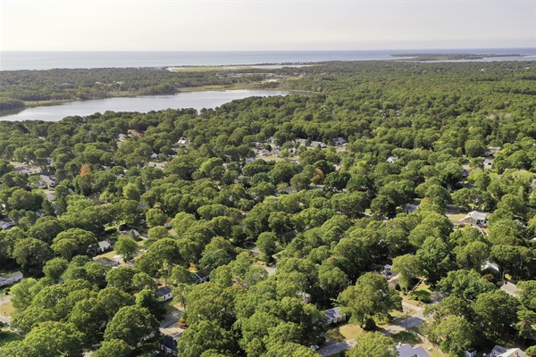 Take in the stunning aerial view of our home—your perfect retreat nestled in nature, offering both beauty and tranquility from every angle.