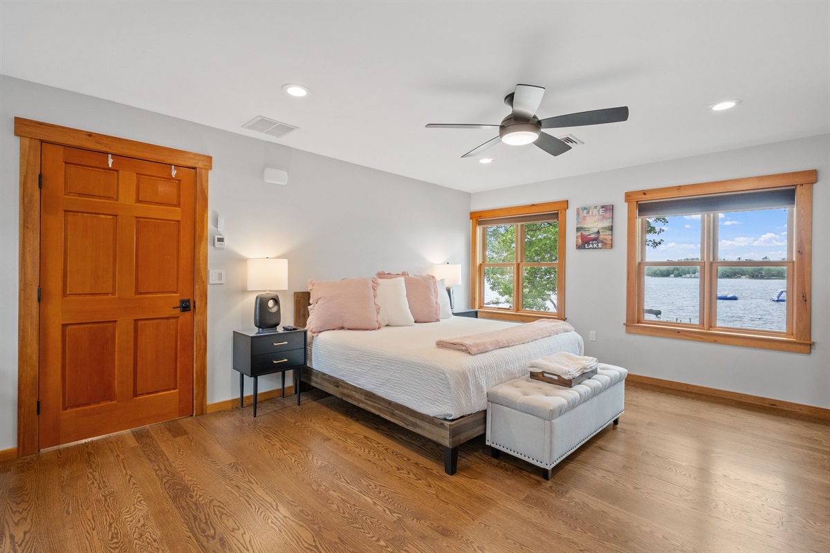 Second floor guest bedroom with king and two queen beds, the bath for this bedroom is a few steps down the hall