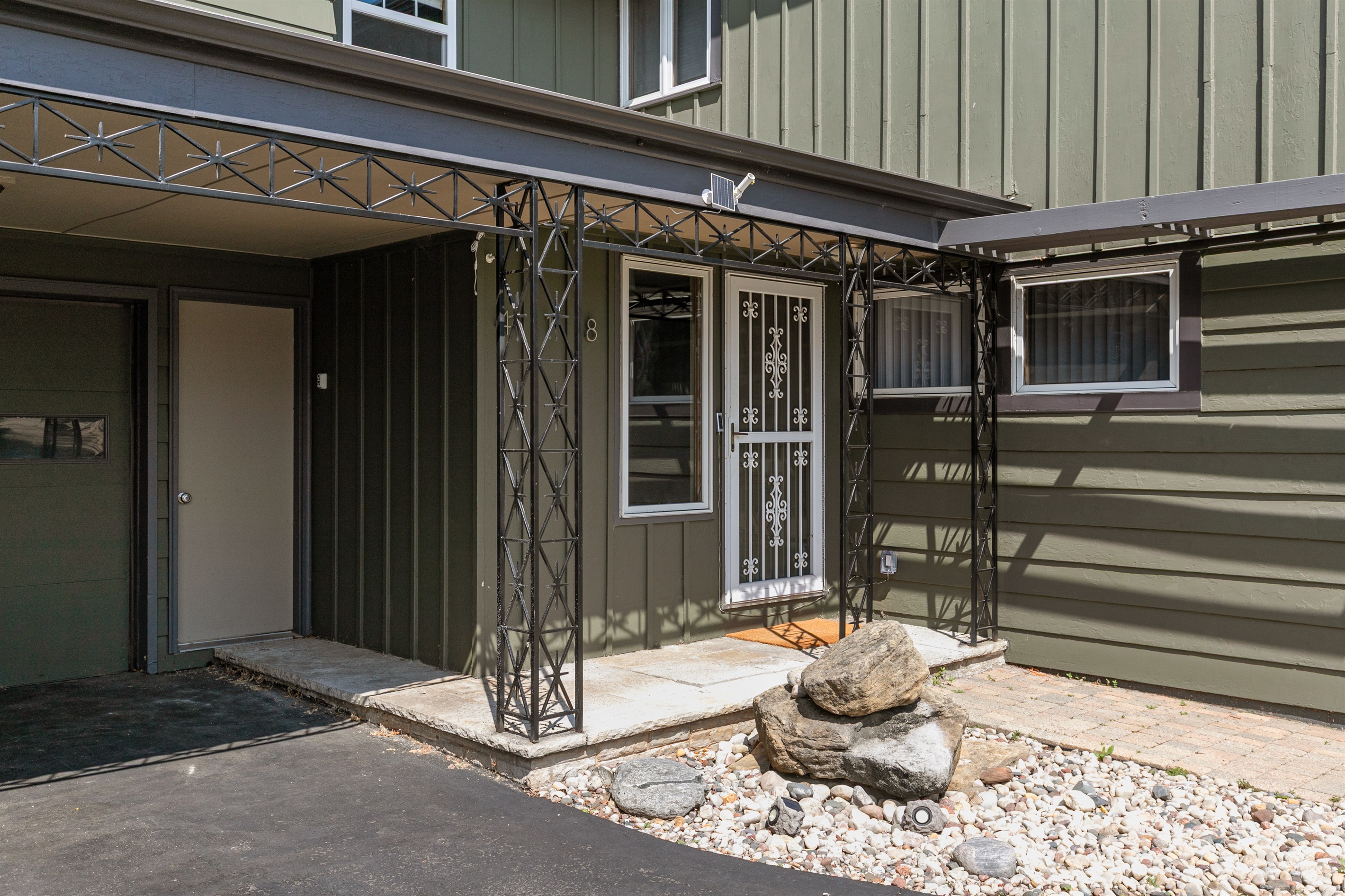 The front entrance door opens into a warm and welcoming space, inviting you to step inside and feel right at home.
