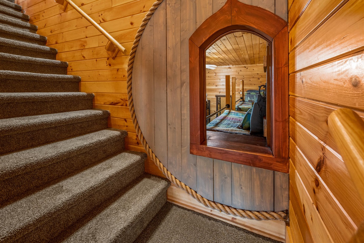Bunk Room: Your magical little creatures will love our enchanting hobbit door. Bedtime has never been more fun. Full sized door for hobbit parents also included!