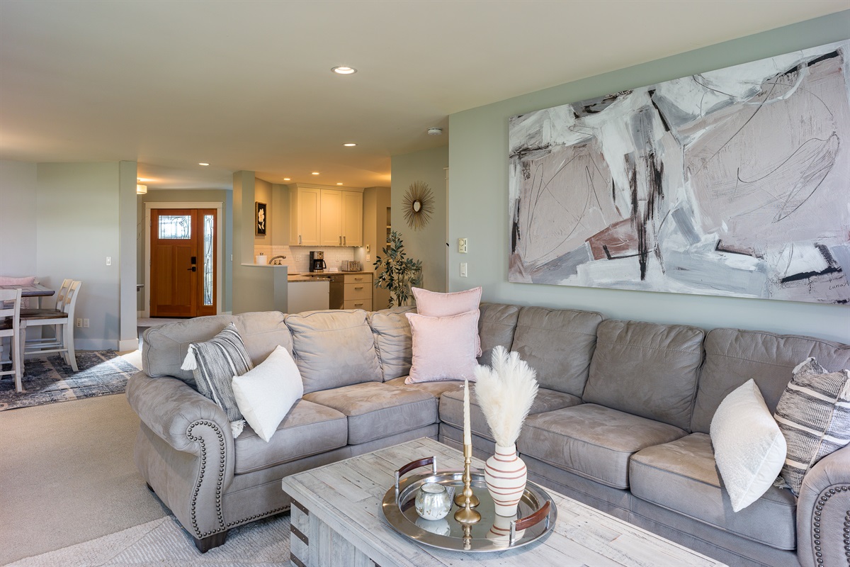 There is plenty of comfortable seating for everyone in this thoughtfully designed living area. 