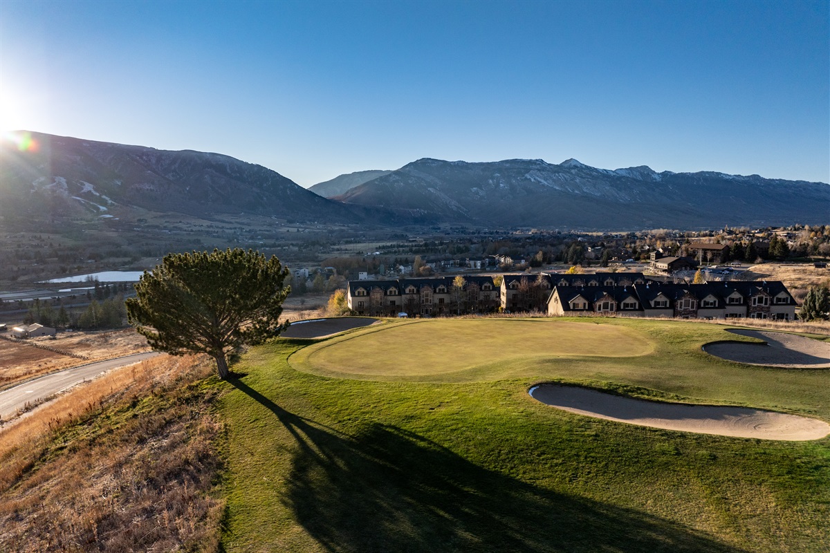 Golf with breathtaking mountain backdrops.
