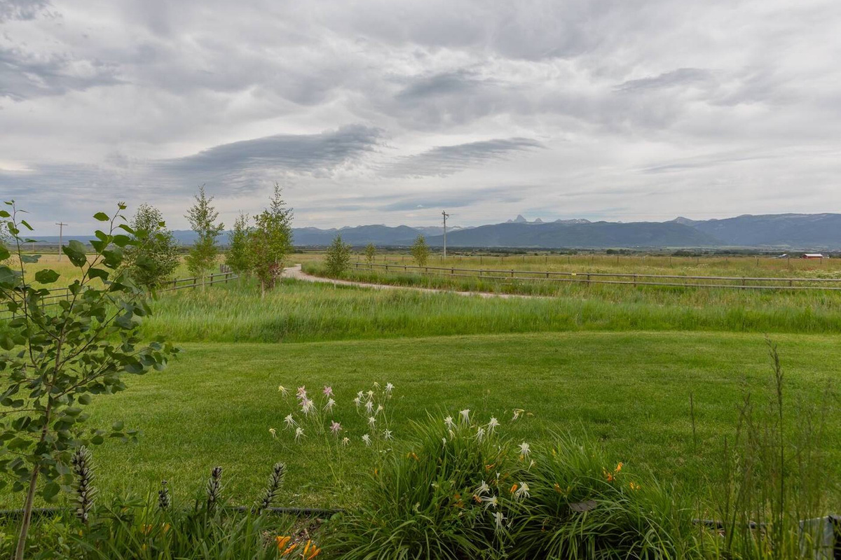Expansive mountain and pasture views from the front porch