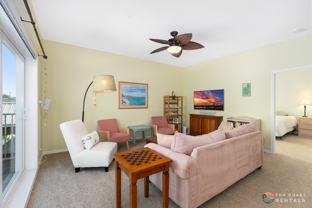 Living room area with 55" Smart TV and Sonos surround sound!