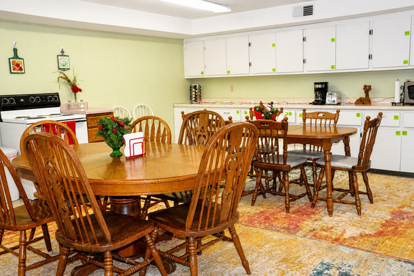 Full of nostalgic "church basement" feel, this lower-level kitchen is fully stocked and ready to feed the family.