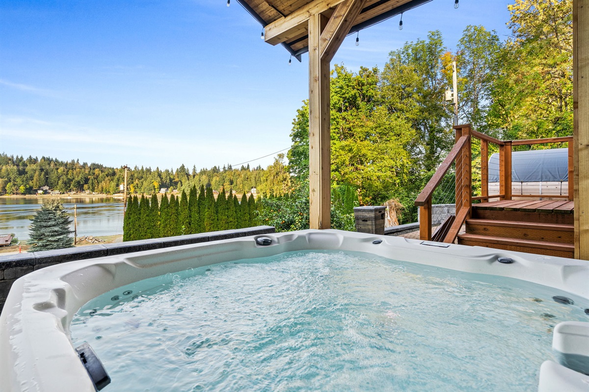 Soak up the sun and stunning waterviews from the relaxing hot tub—pure bliss