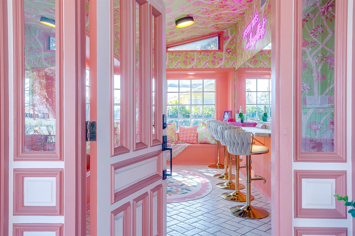 Front entry opening into the signature Beauty Bar