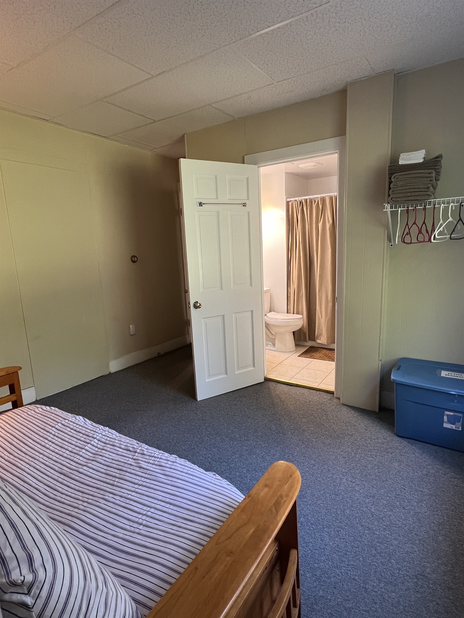 1st floor bedroom #2 suite w/ Queen and futon and private en-suite full bathroom.