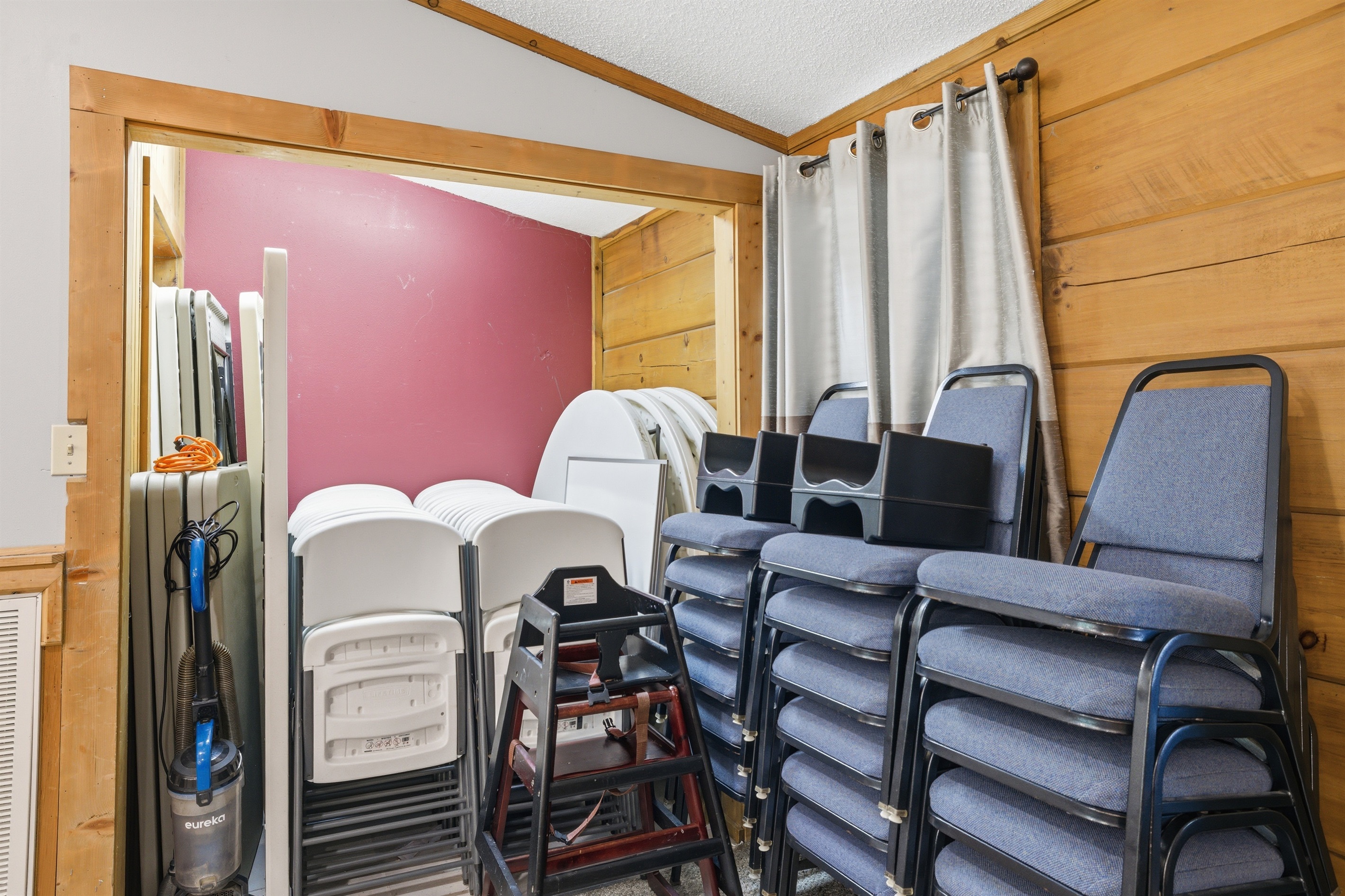 Extra tables and chairs- located in dining room.