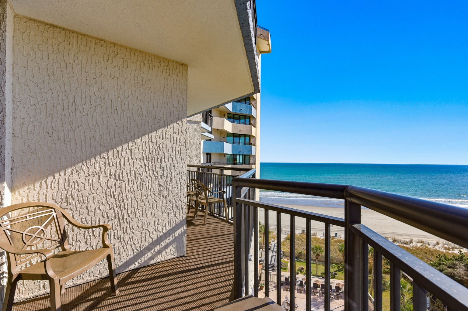 Oceanfront balcony with seating