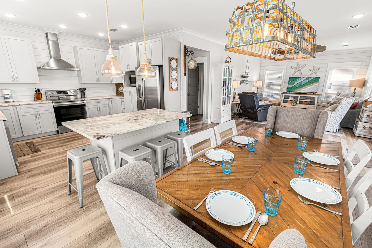 Dining table for six and the island will seat four.