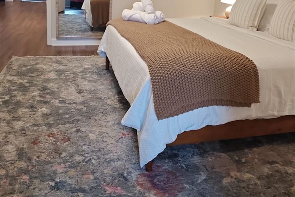 Bedroom with a plush bedding and relaxing atmosphere.