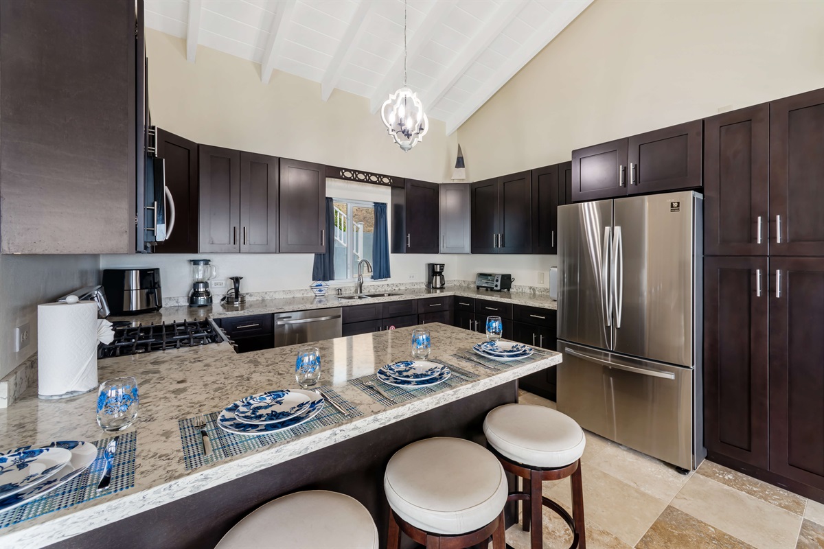 Cook up something special in the fully equipped kitchen with modern appliances.