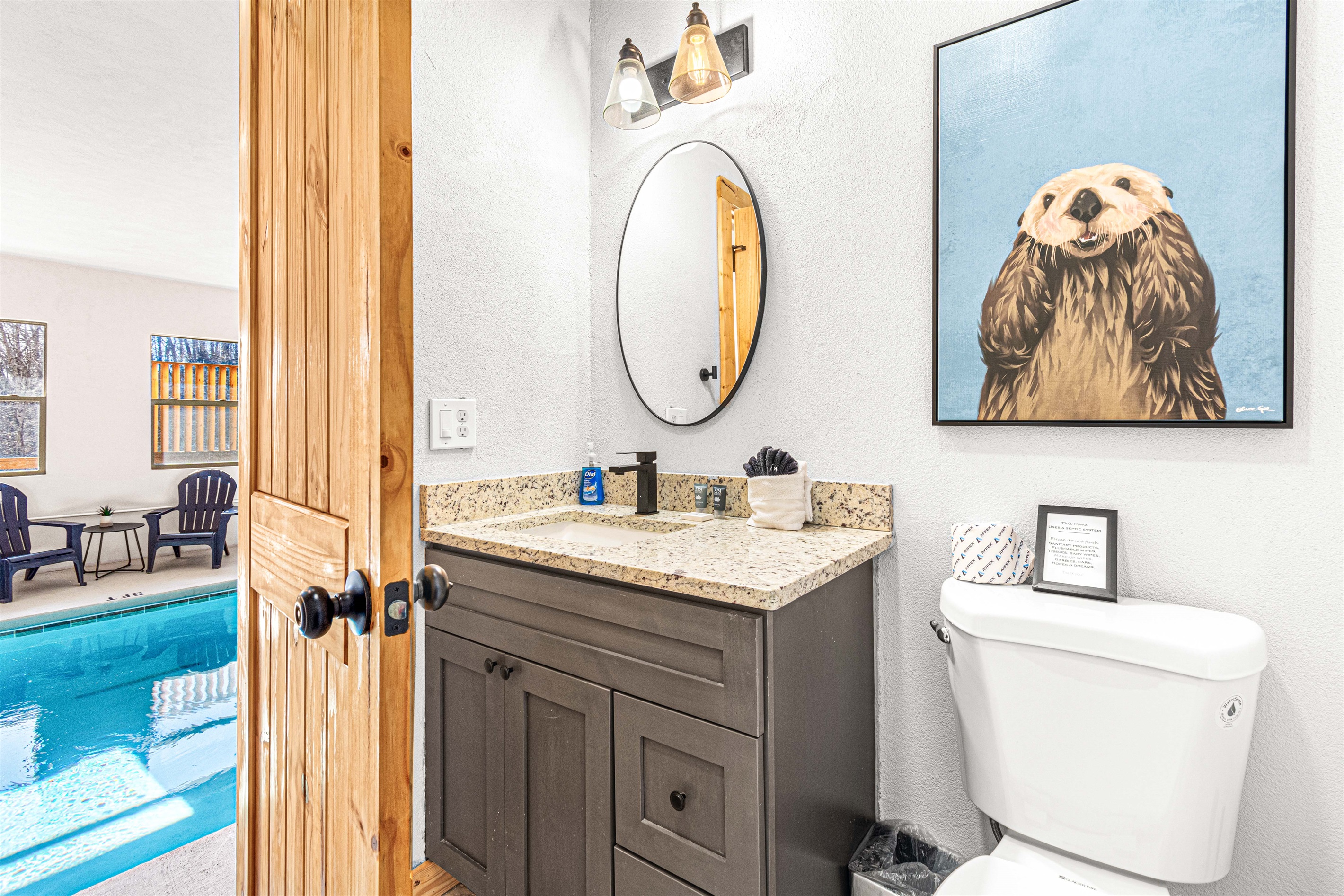Full bathroom in pool room can also serve as a changing area.
