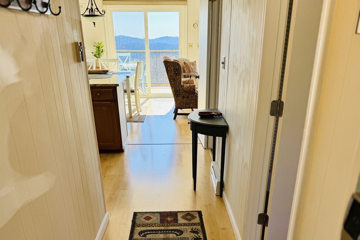 View from the front door / entryway. These amazing views can be seen from the patio, the porches, & all 3 levels in the home!