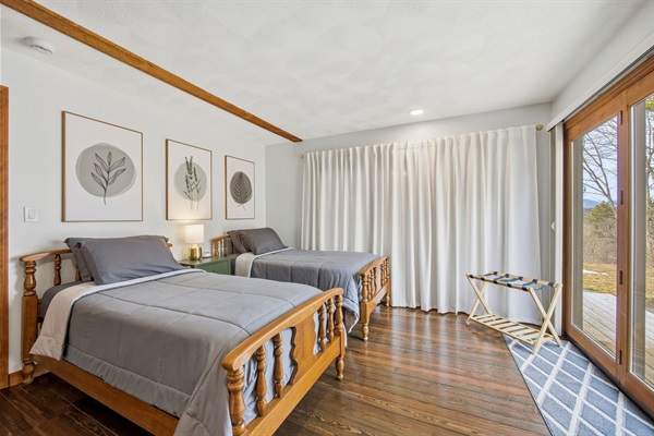 First floor bedroom with two twin beds view 1