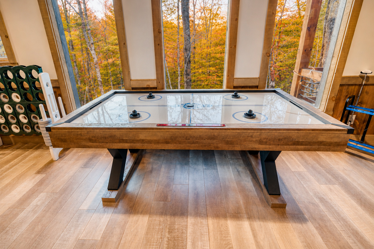 Air hockey is just part of the fun on our lower level