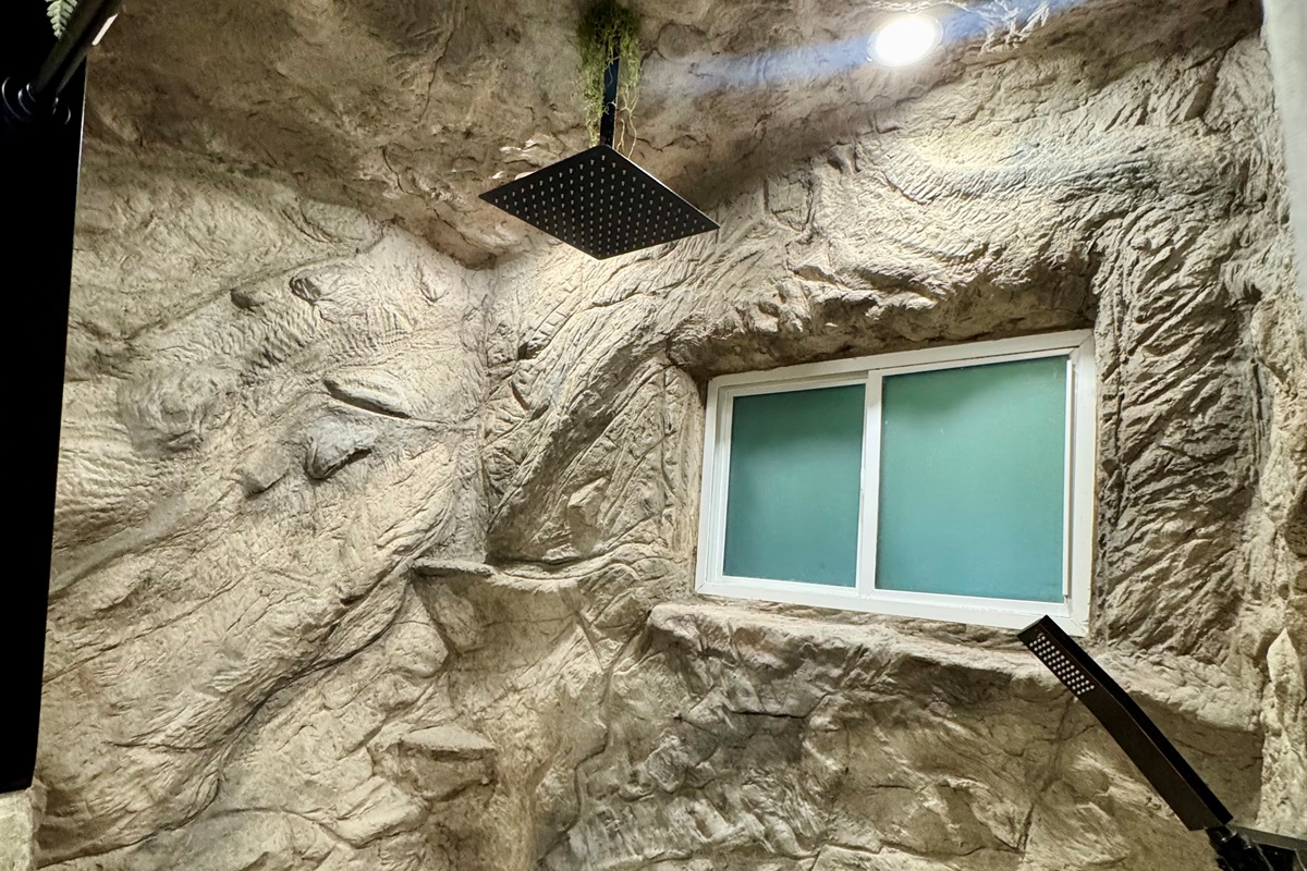 Shower, encased in rock!