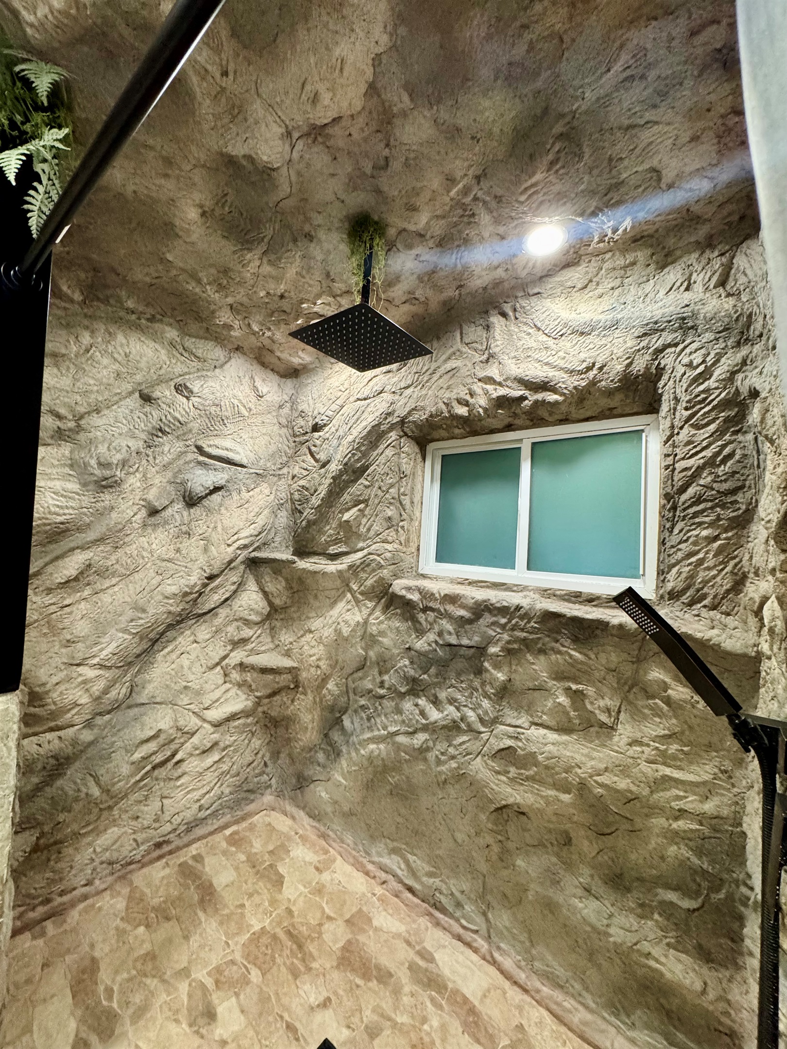 Shower, encased in rock!