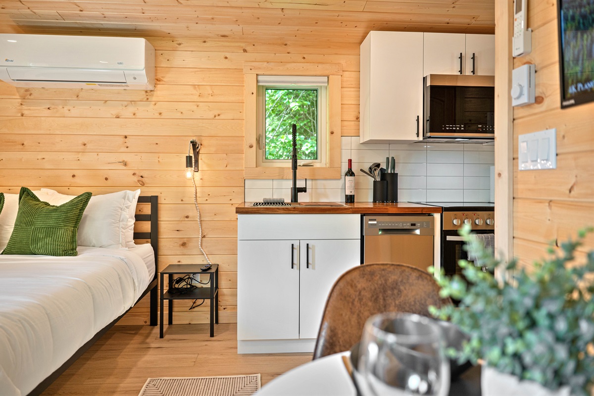 View of the kitchen and sleeping area, studio style
