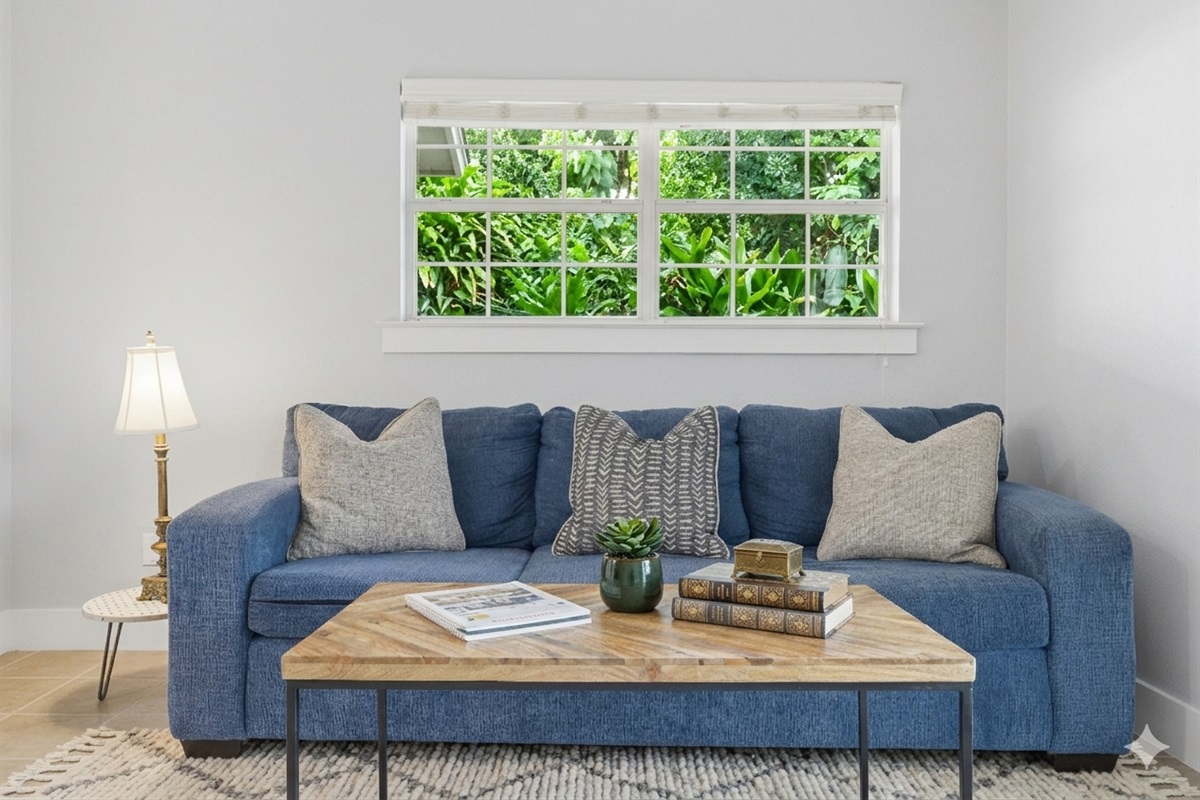 living room 2 has a 3 seater sofa, 60 inch TV