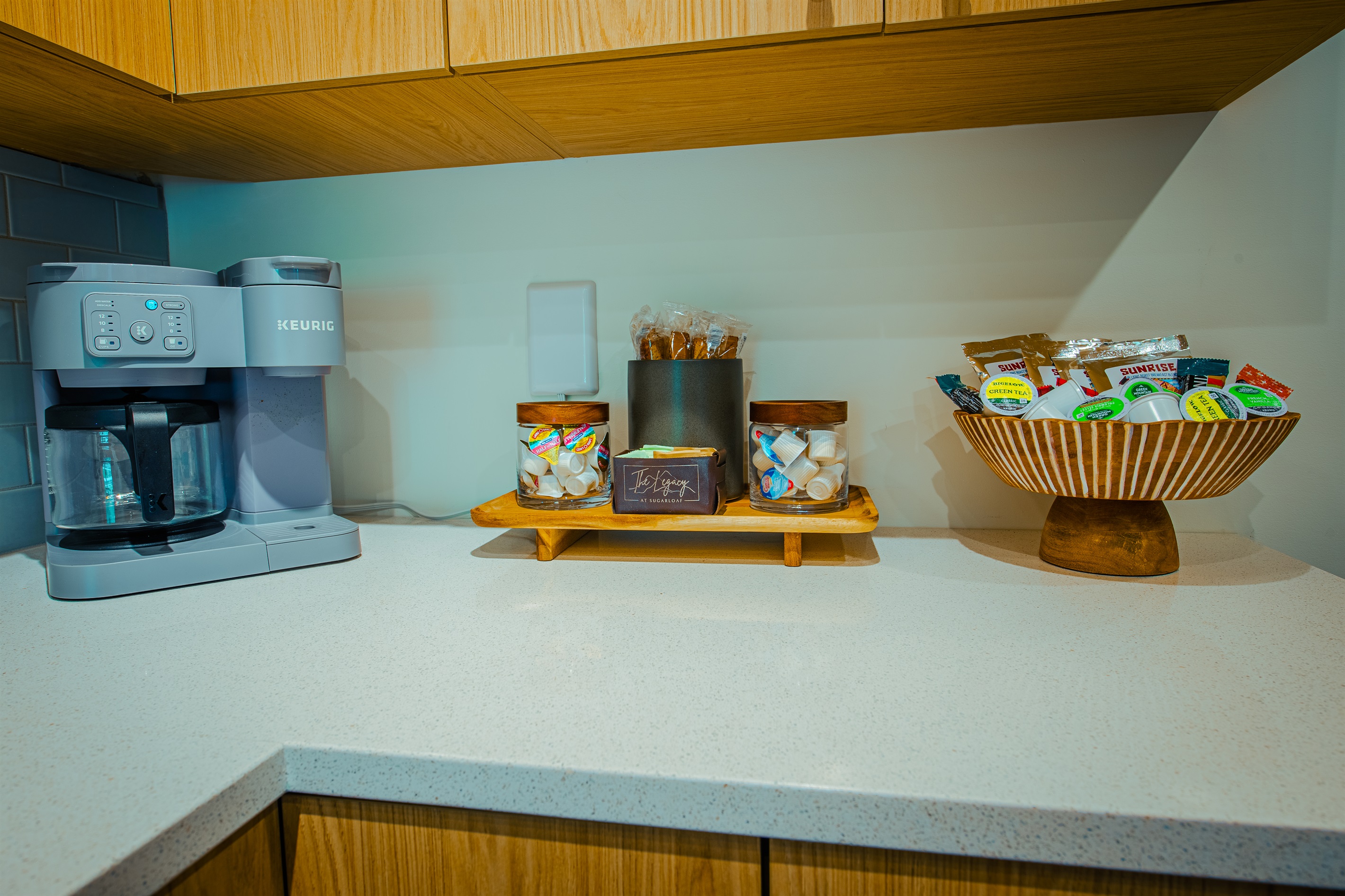 Coffee bar with local drip coffee and K-cups, 1/2 & 1/2, non-dairy coffee creamer, sugar in the raw, stevia, tea and hot chocolate.