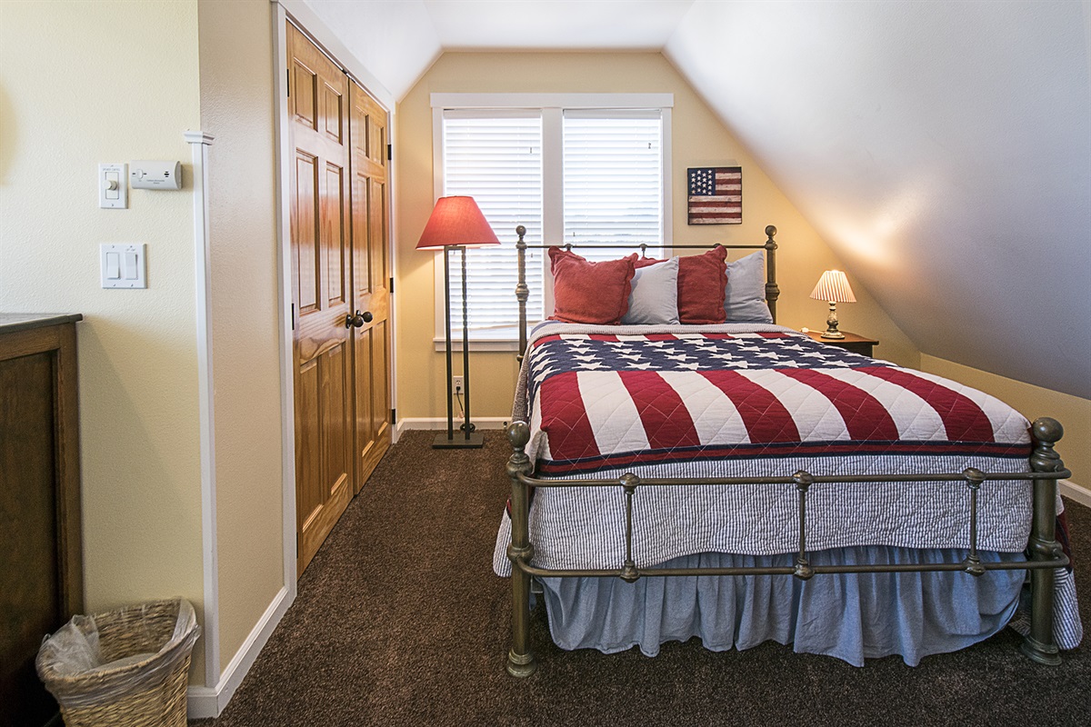 Soft, inviting quilts make the queen bedroom the perfect place to recharge after a day at the beach.