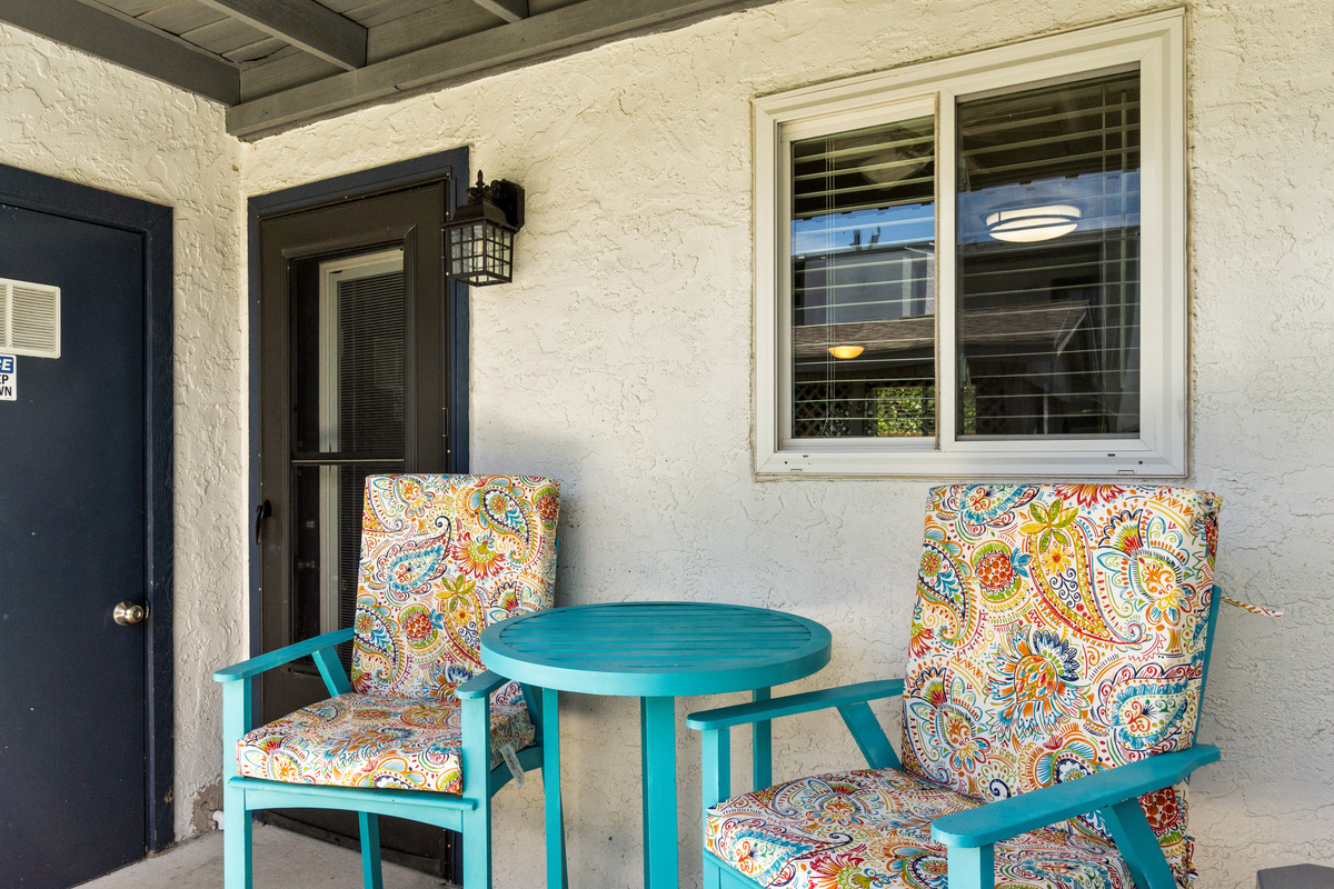 Patio with Outdoor Seating, Pool Access, and Grill. 