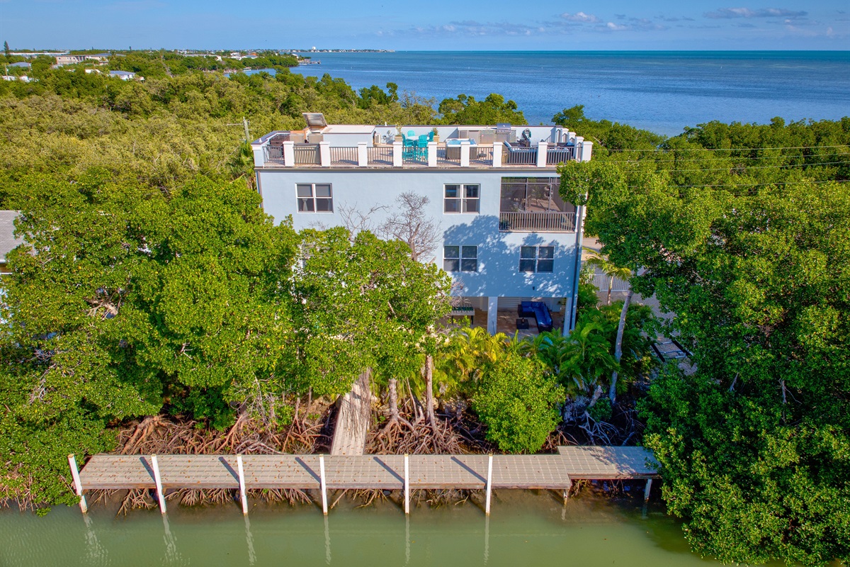 A modern roof top patio home with plenty of dockage