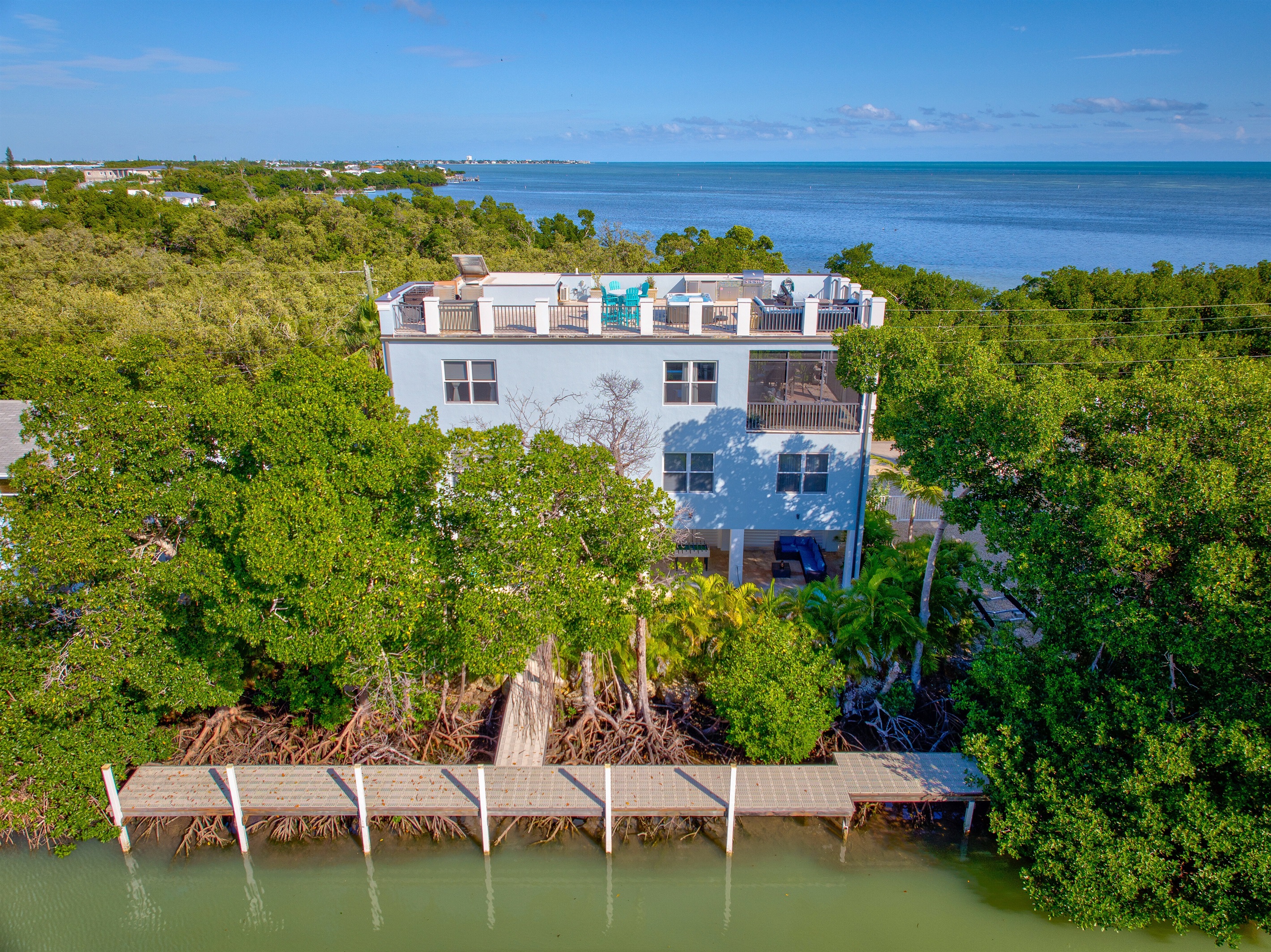 A modern roof top patio home with plenty of dockage