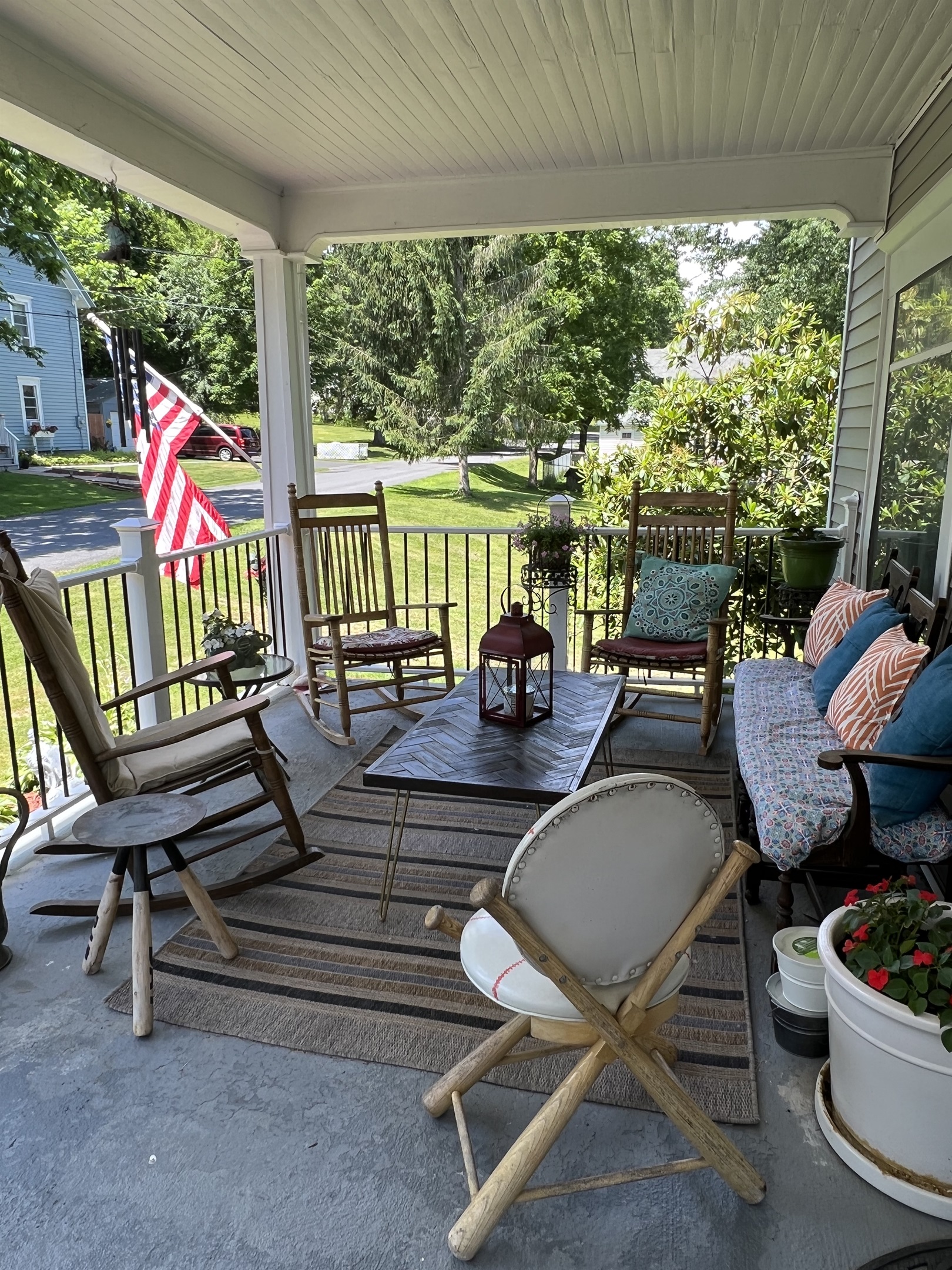 Covered front porch, with plenty of room for all