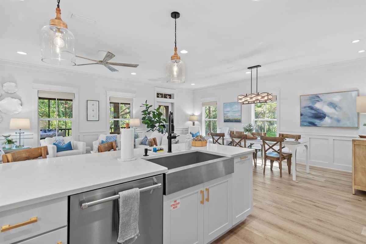 Fully stocked Kitchen - Open concept kitchen close to dining and living room - KitchenAid Dishwasher, garbage disposal in farmhouse large sink.