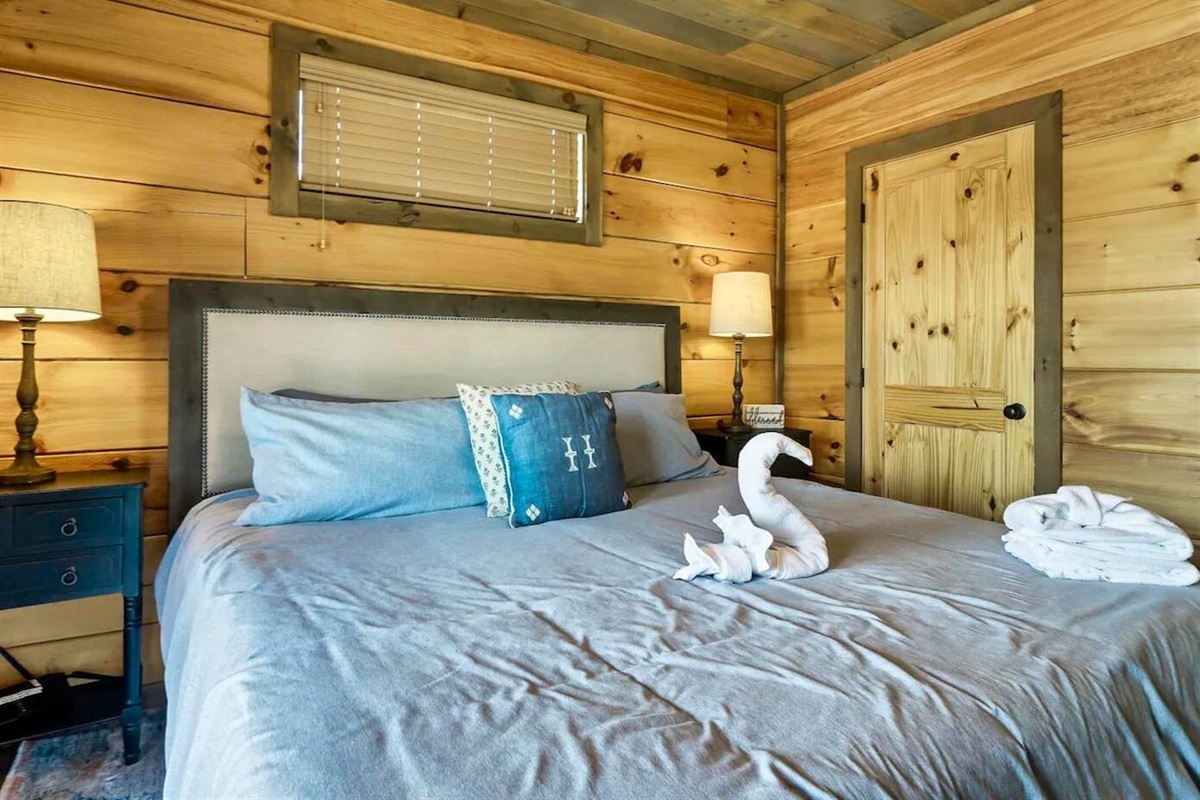 King Suite with Private Bathroom and Inviting Bedding