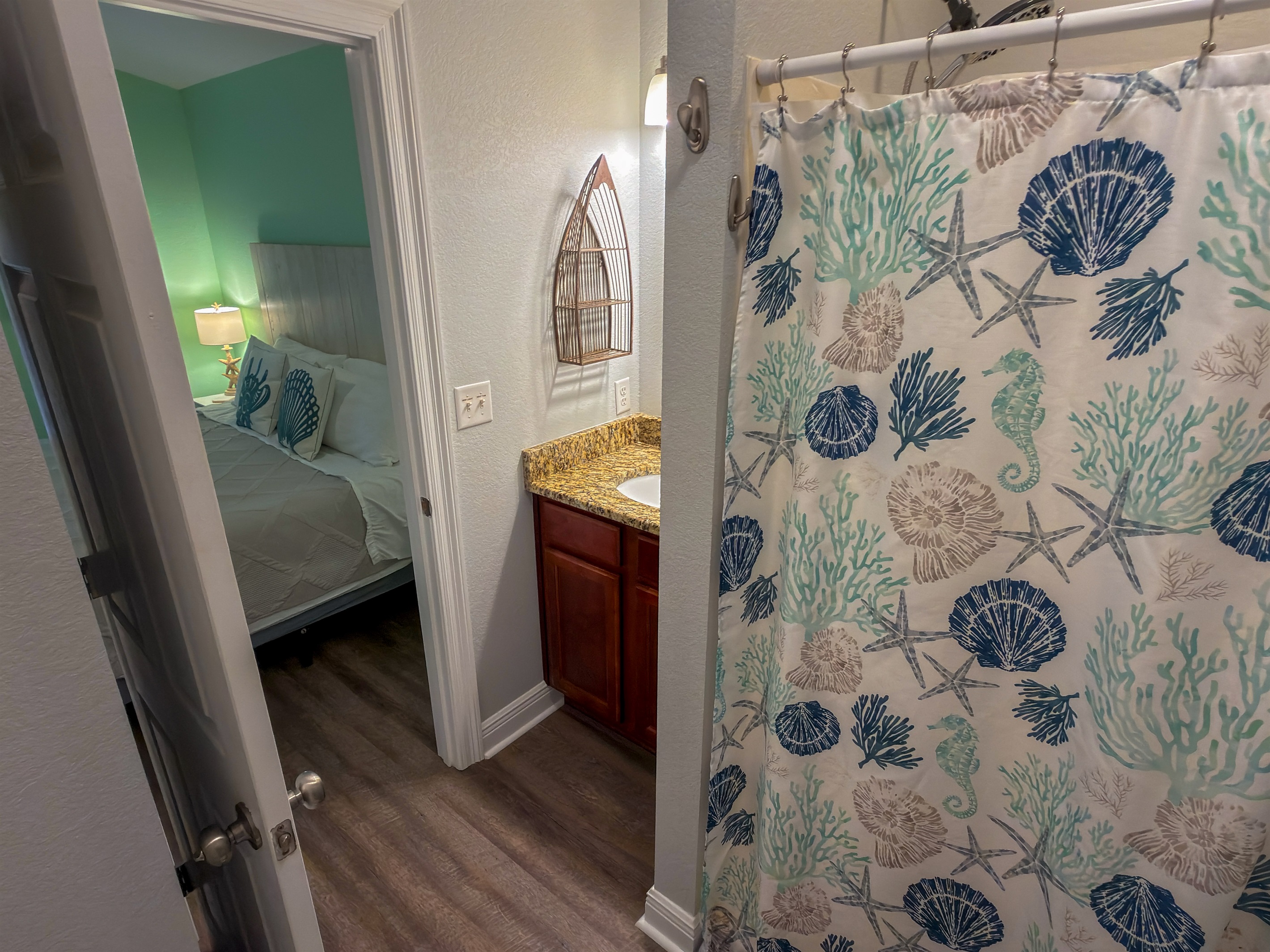 From the soothing beach-inspired color scheme to the playful coral patterns, this space captures the carefree spirit of coastal living.