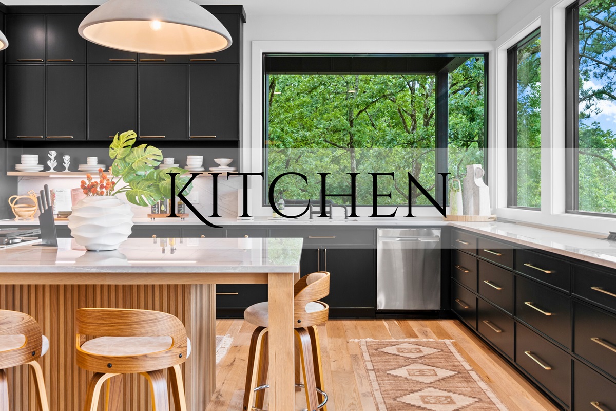 A chef’s paradise, this kitchen combines sleek design with top-notch functionality. The spacious layout and modern appliances make cooking a delightful experience.