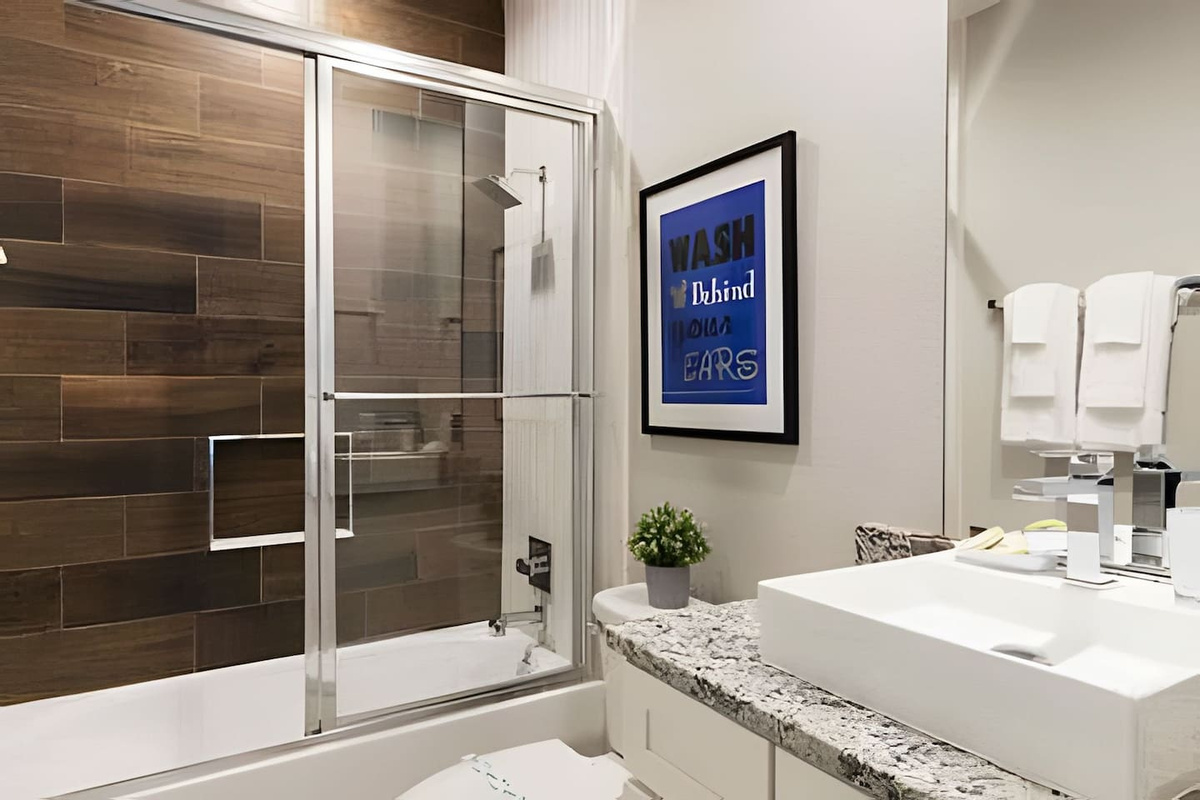 Modern bathroom with elegant design and premium towels.