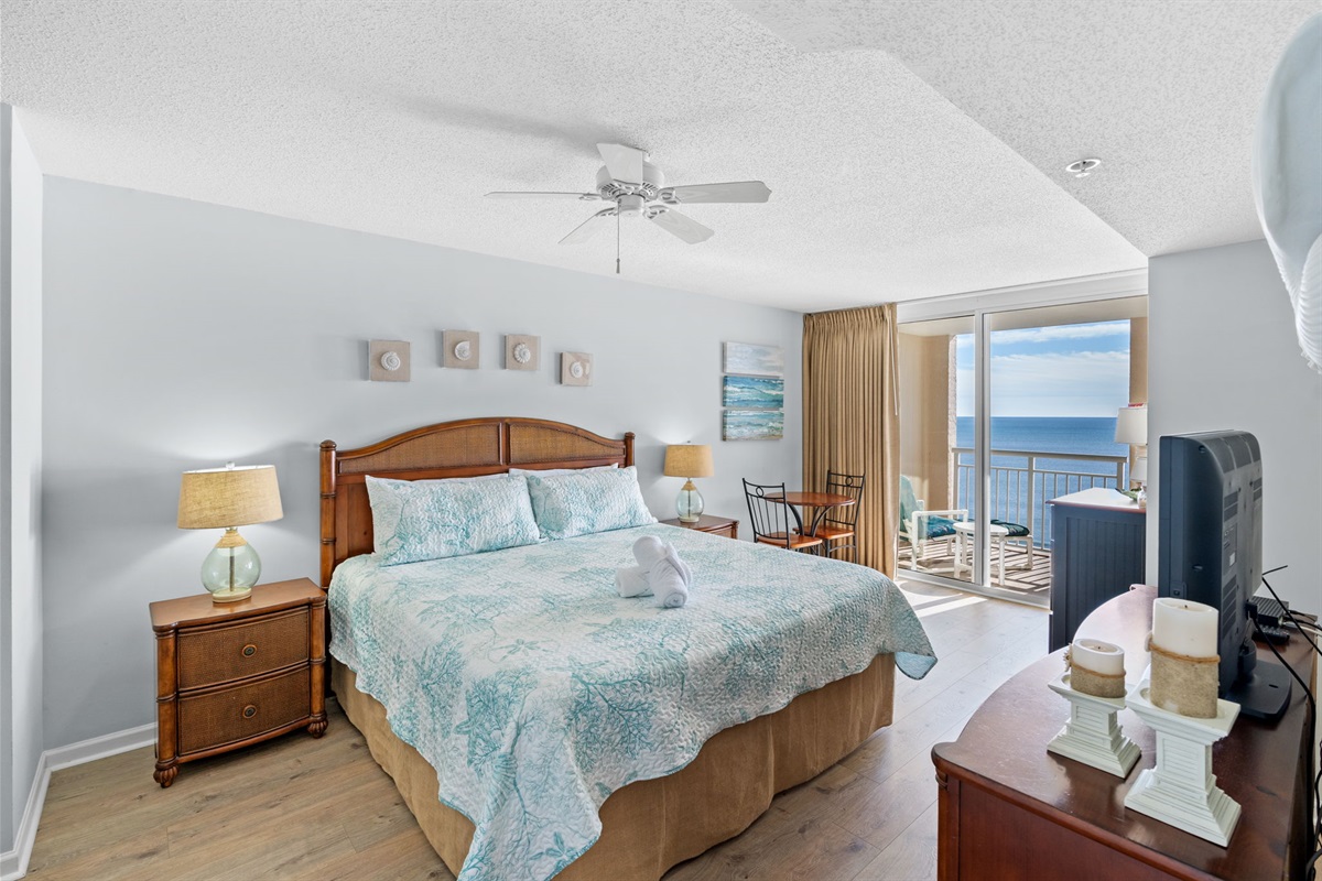 Oceanfront Main Bedroom with king bed and balcony access