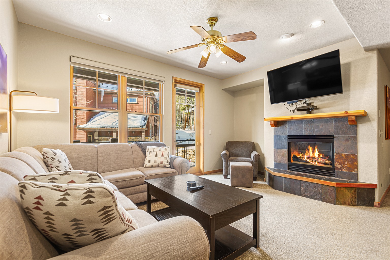 Spacious living room with cozy gas fireplace