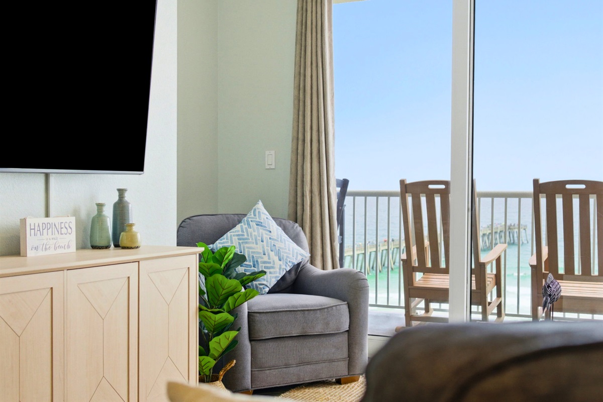 Large windows bring the outdoors in, creating a bright and welcoming space where the Gulf is always in sight.