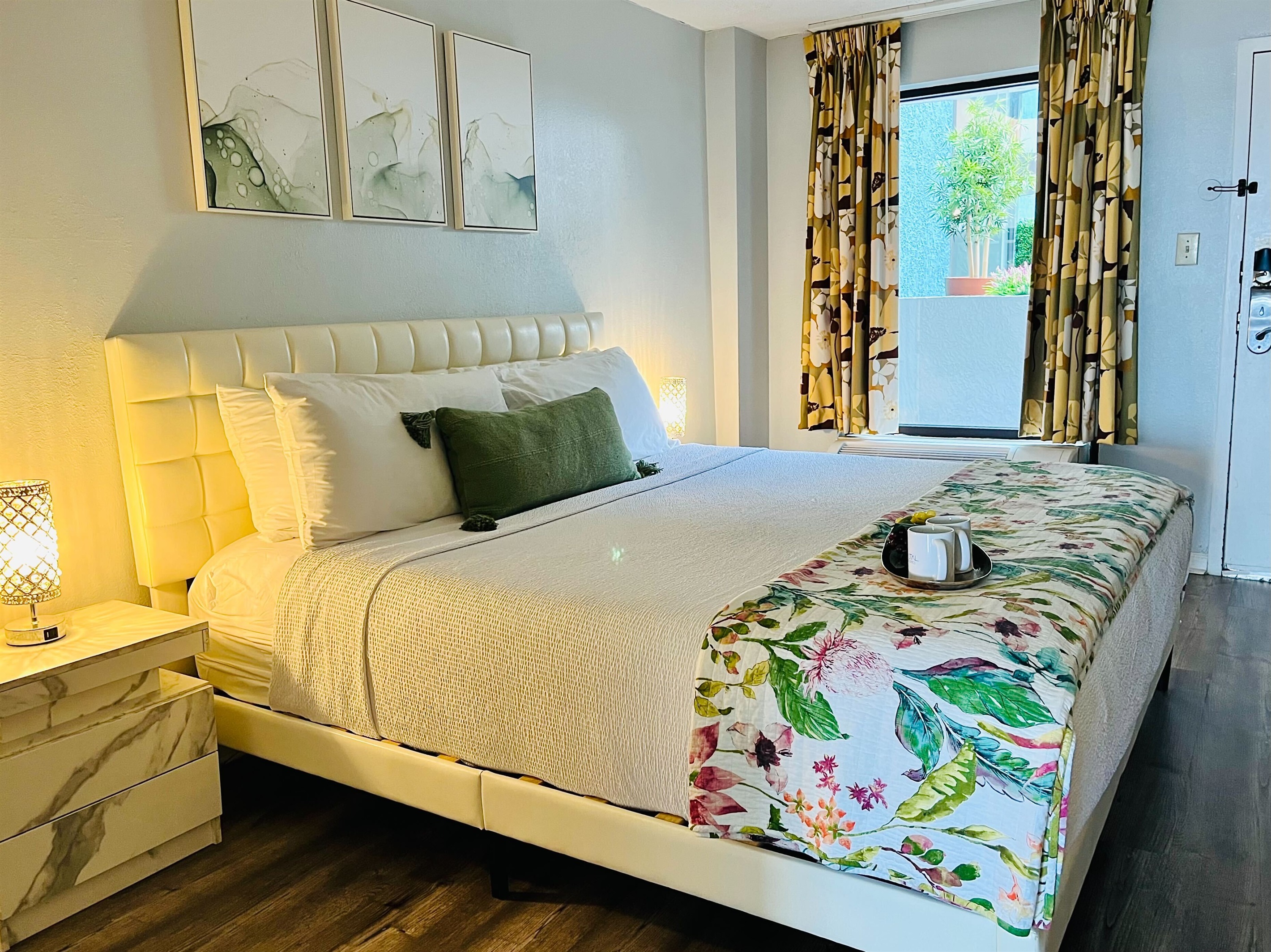 Discover charming coastal decor accents that adorn the bedroom, seamlessly blending the indoor space with the beauty of the ocean just beyond.