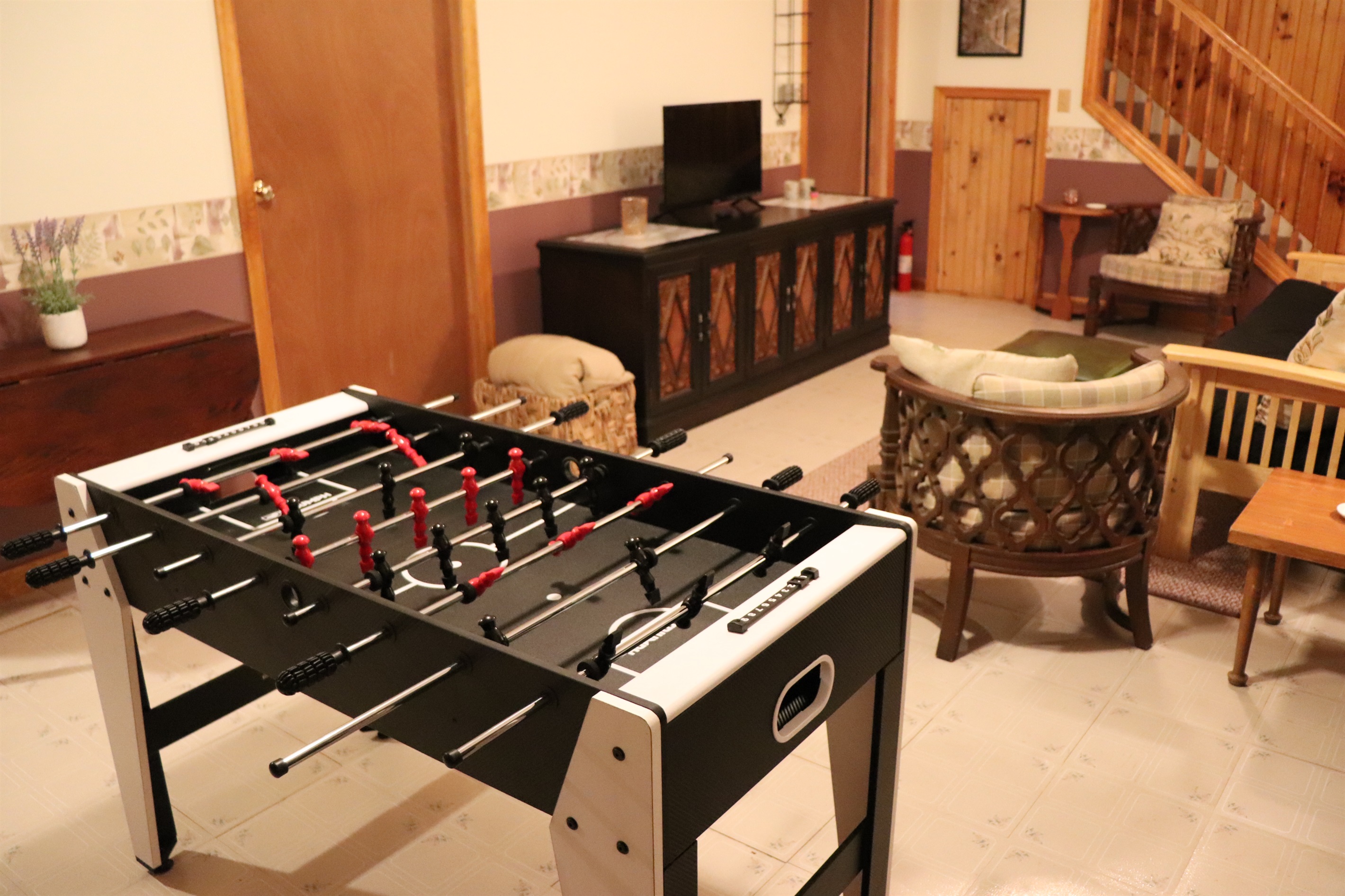 Lower level family/game room with Foosball