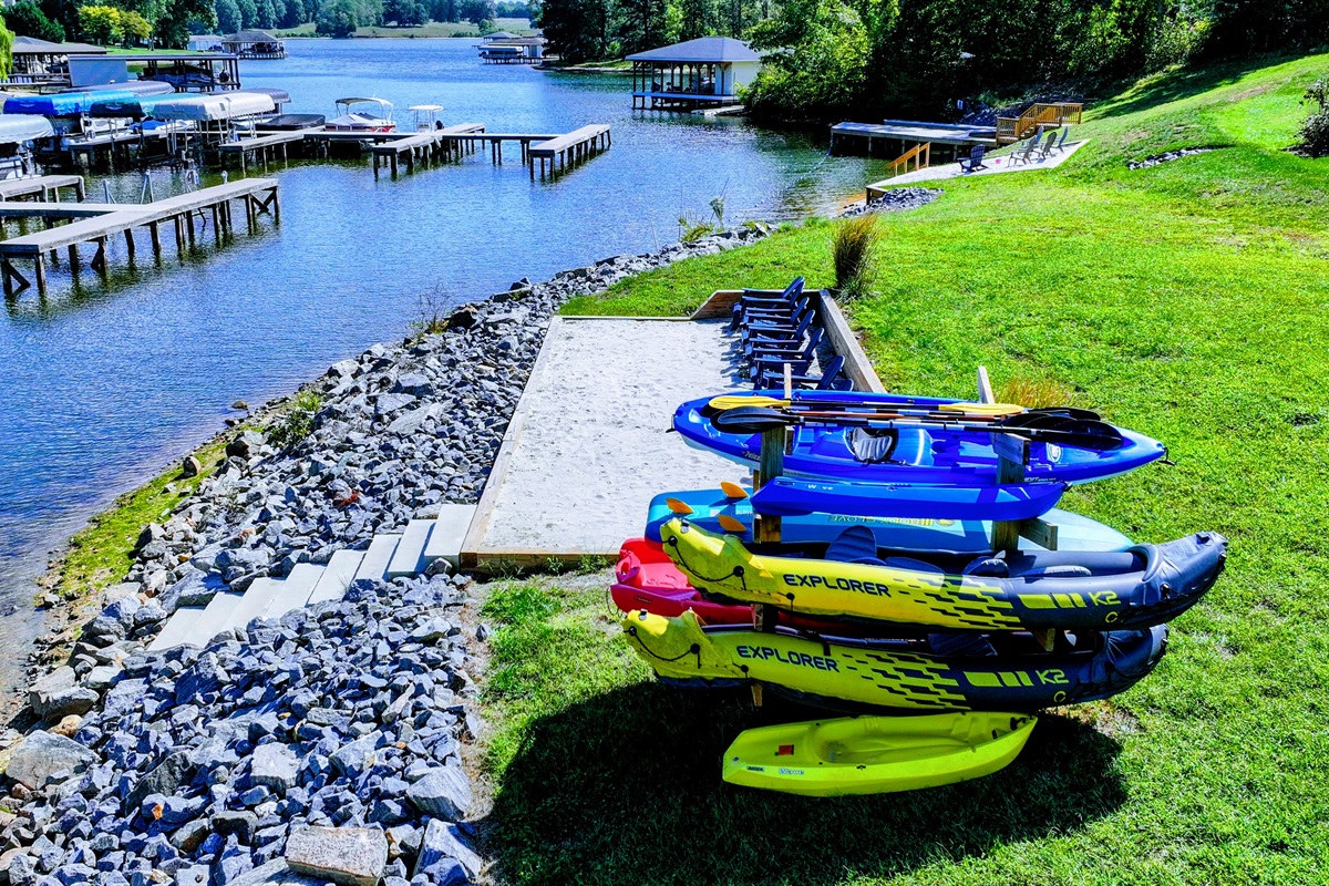 Soak in stunning lake views from this private waterfront oasis! Relax in Adirondack chairs, fish off the shore, or watch boats glide by. Launch your adventure from the dock and enjoy breathtak
