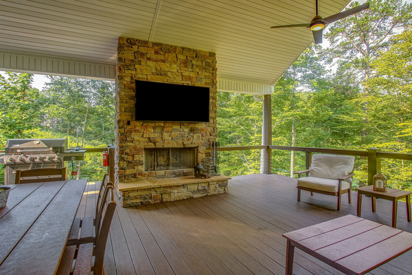 Main level deck fireplace and TV