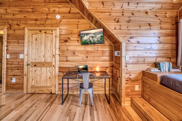 Both upstairs bedrooms also have a desk and chair workspace.